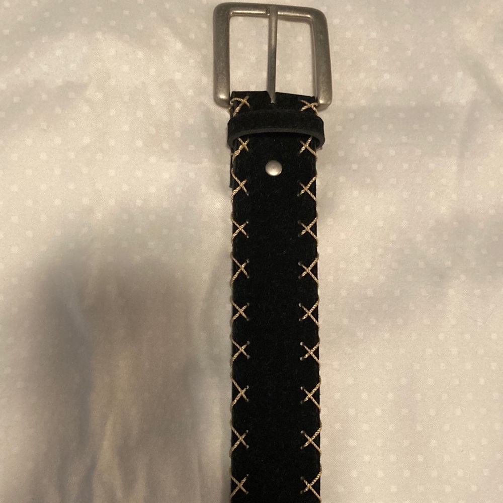 Black belt with gold stitching